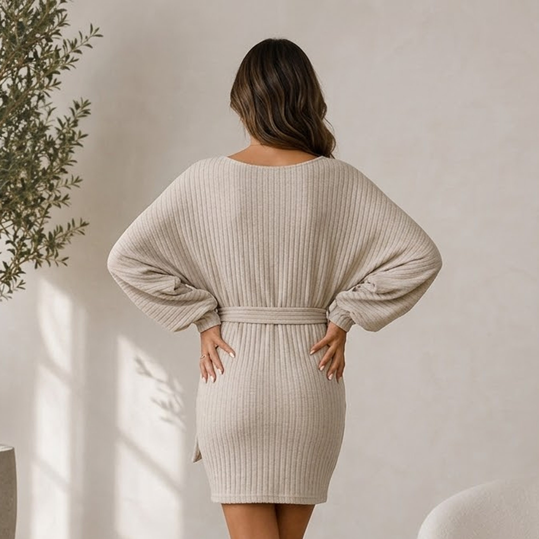 Short ribbed knitted dress with tie waist belt and narrow cuffs