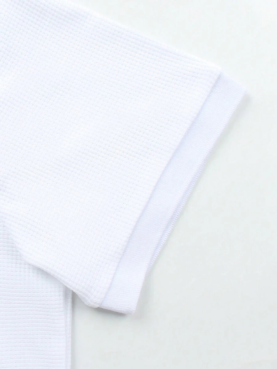 Men's polo shirt and shorts set with open collar detail and lightweight textured fabric