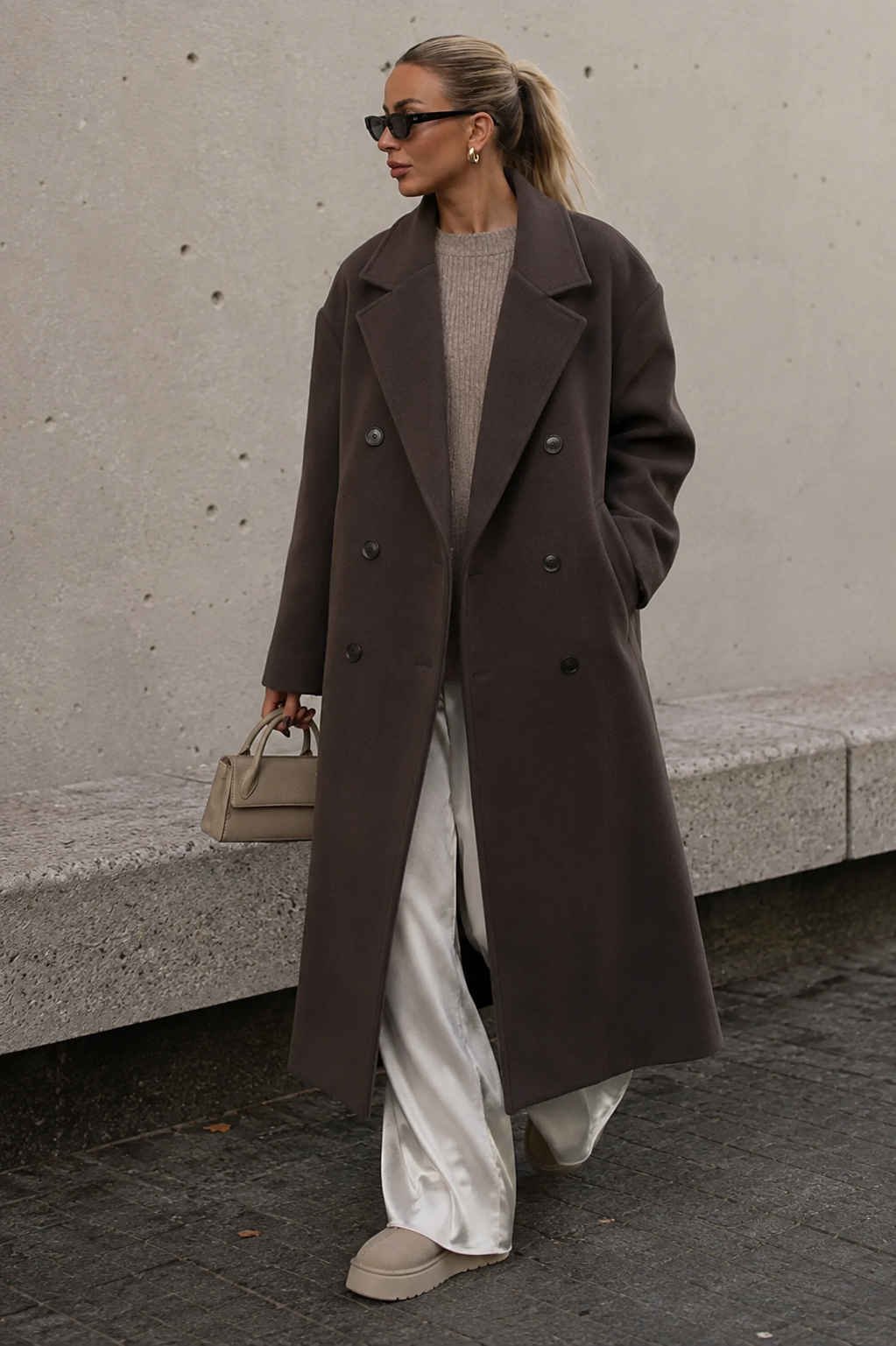 Women's long double-breasted wool blend coat with lapel collar, front view