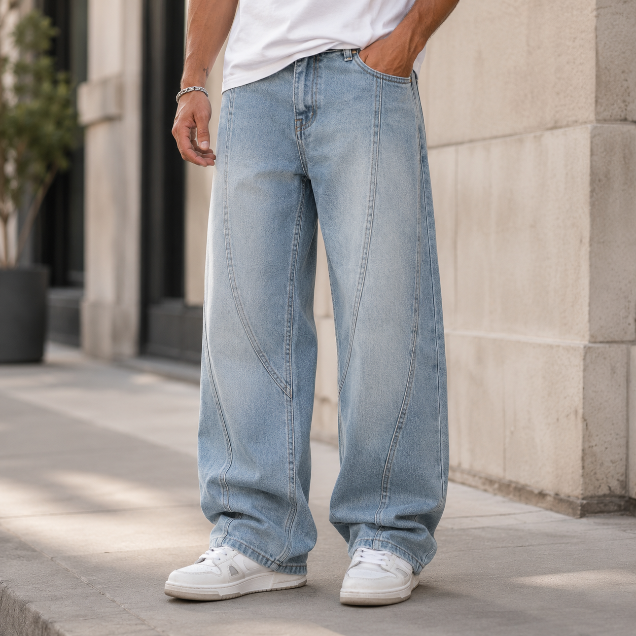Men's wide-leg panel jeans with structured denim fabric and washed finish