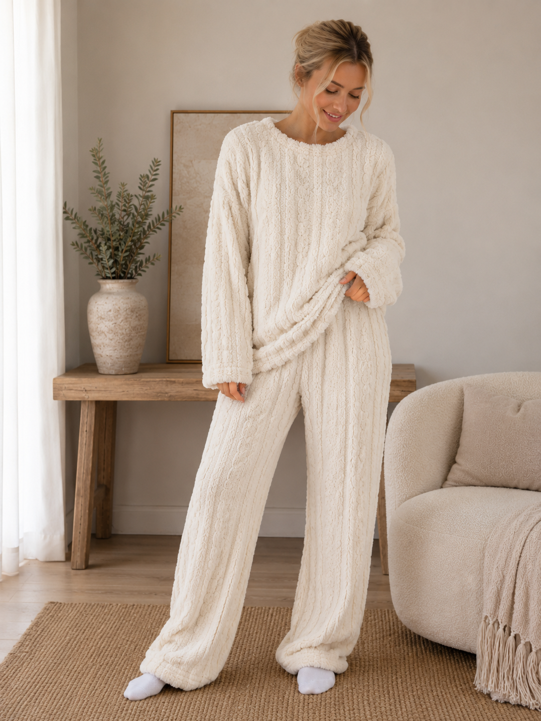 Women's two-piece fleece lounge set with relaxed-fit sweater and coordinating straight-leg trousers