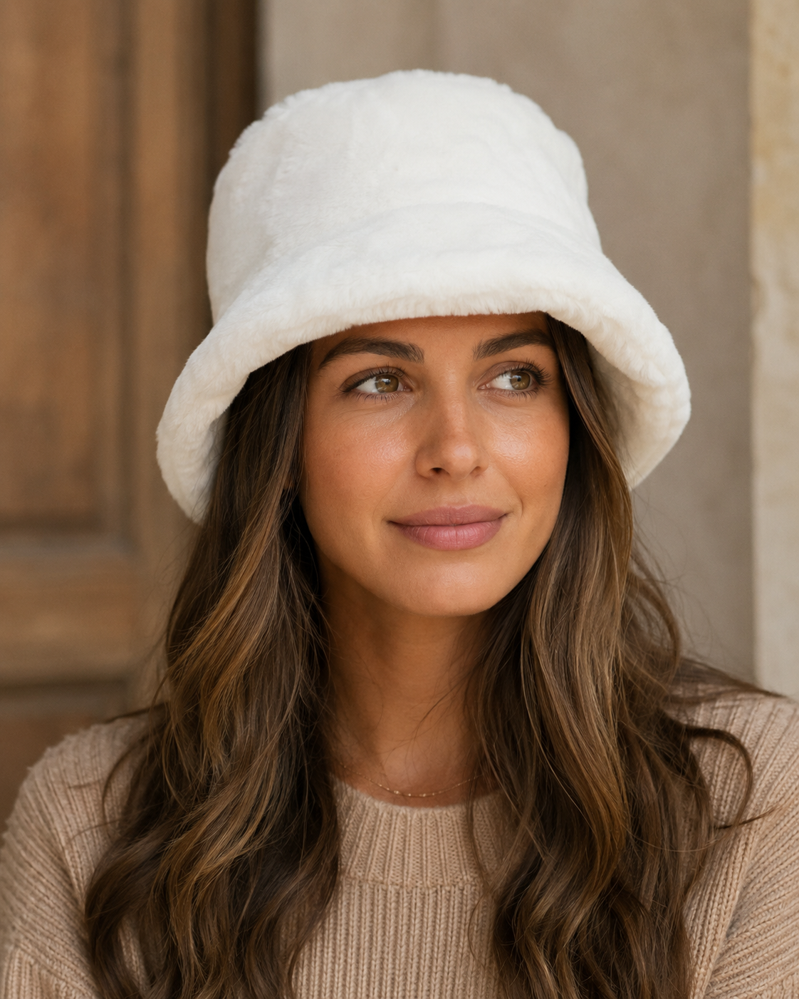 Women's faux fur bucket hat with soft plush texture, front-facing view