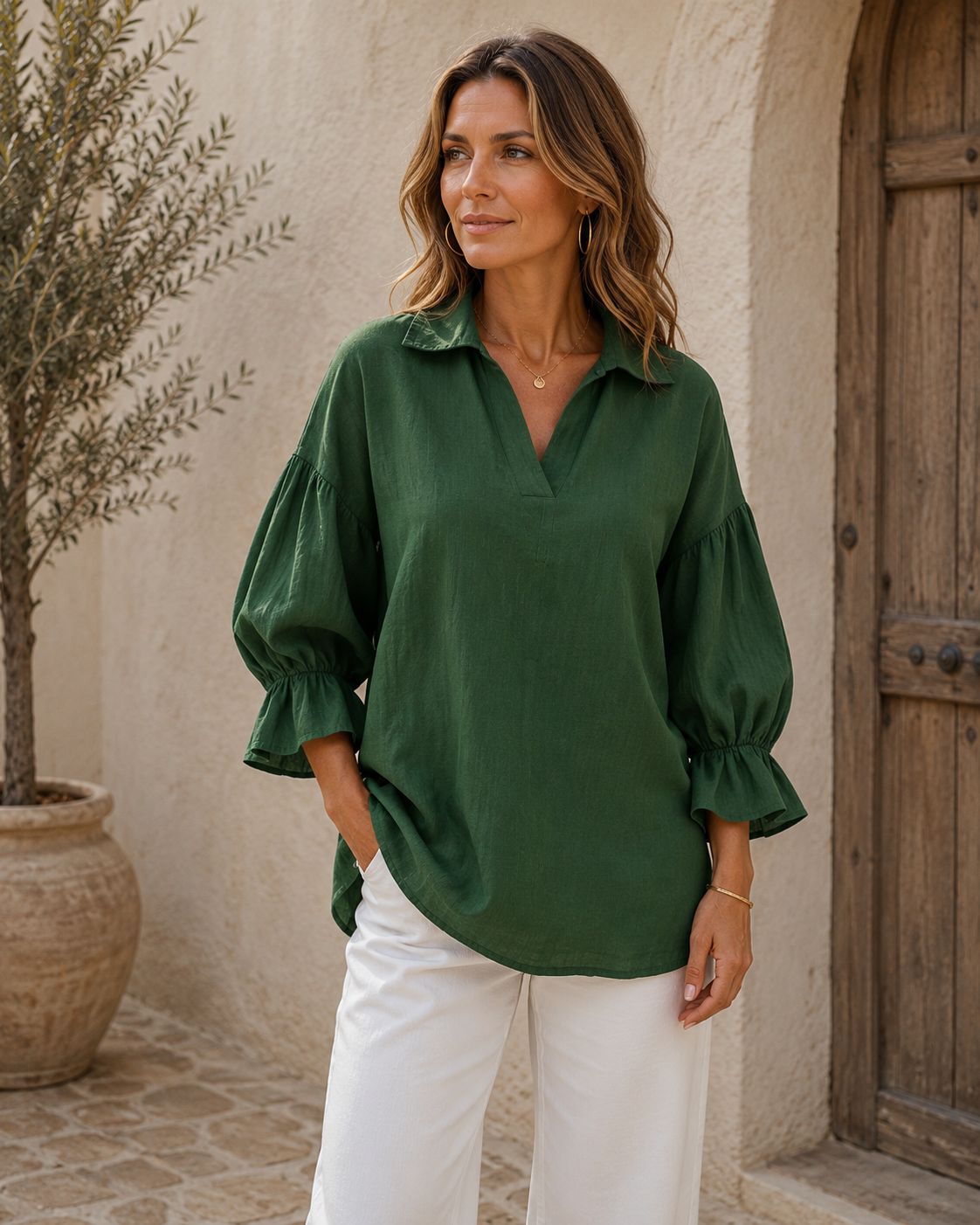 Women's relaxed-fit blouse with V-neck collar and soft puff sleeves