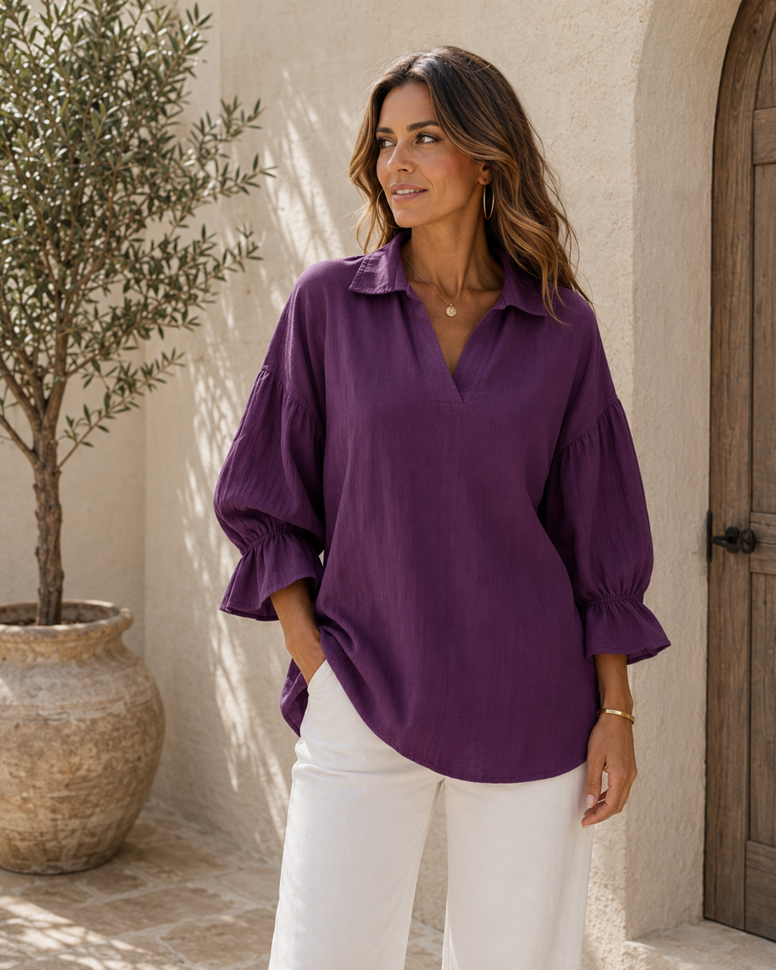 Lightweight women's V-neck blouse with puff sleeves and a flowing silhouette