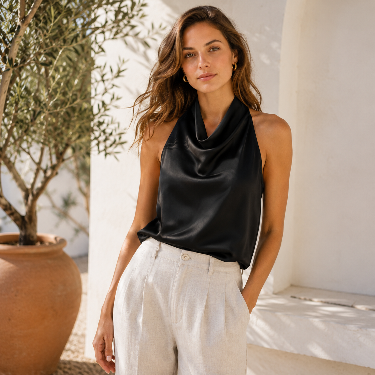 Draped neckline detail on women's halter top
