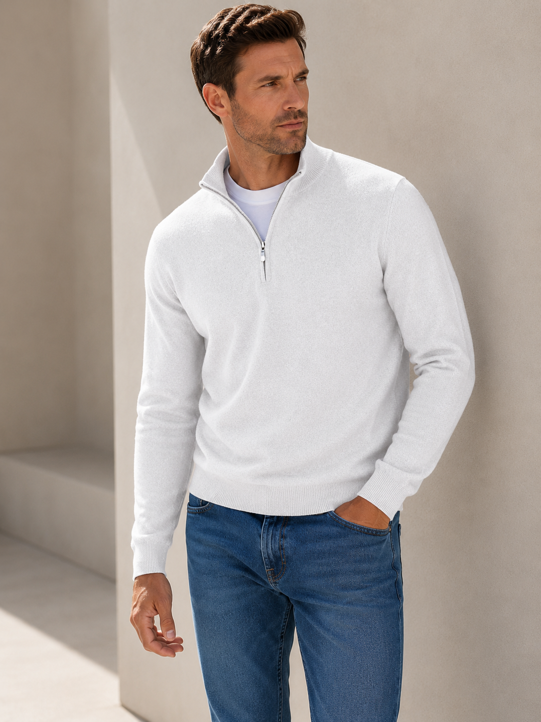 Men's wool-blend half-zip sweater worn in a lifestyle setting, showcasing the high collar and regular fit