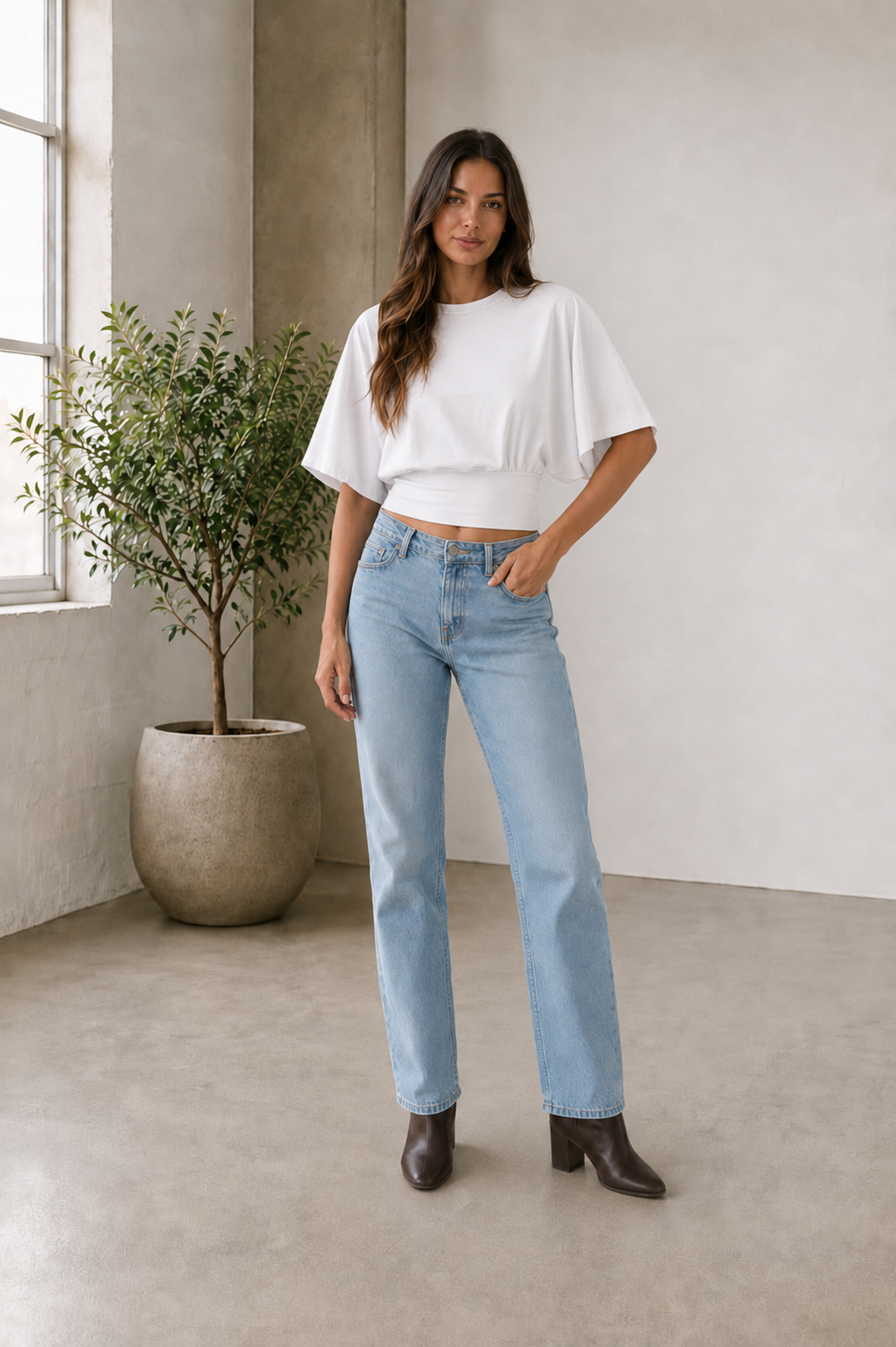 Short-sleeve draped women's top with fitted waist and structured bodice