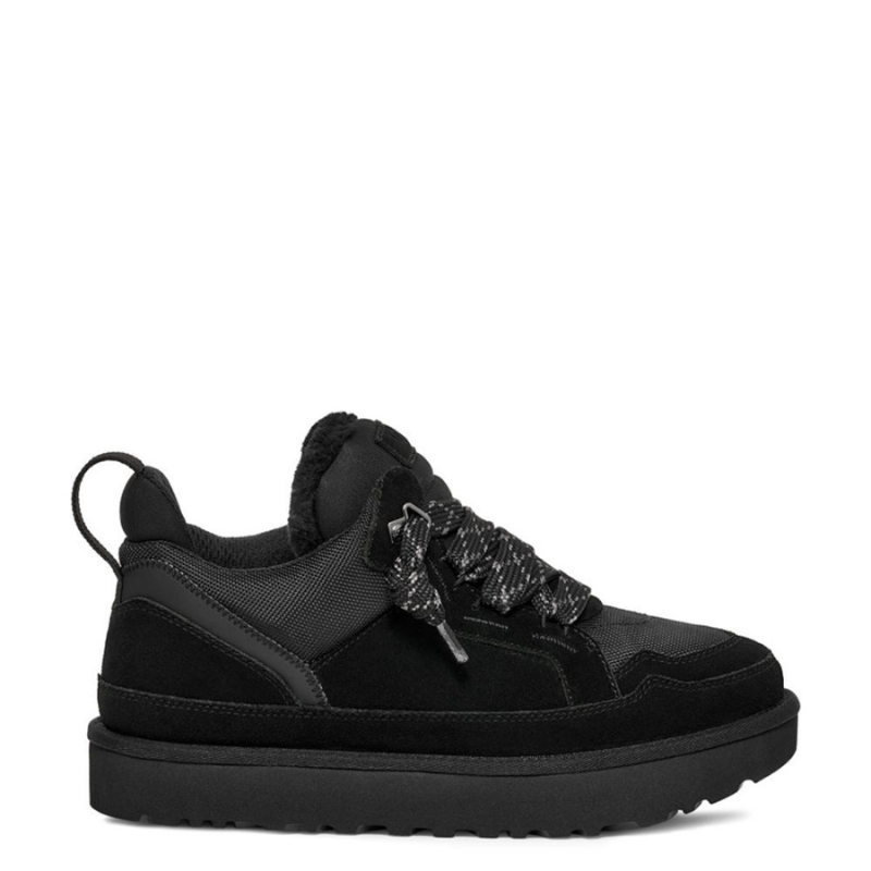 Women's low-top sneakers with lace-up closure, structured panel construction, and back pull tab