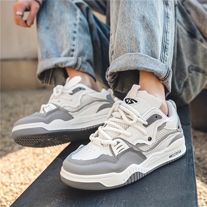 Lace-up men's sneakers with structured panel upper, padded collar, and thick molded rubber sole for everyday wear
