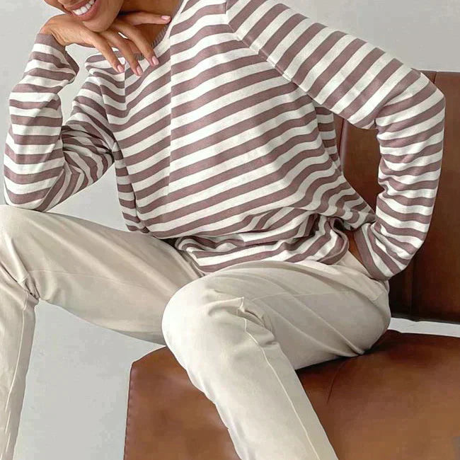 Women's relaxed-fit knit top with long sleeves and horizontal stripe pattern