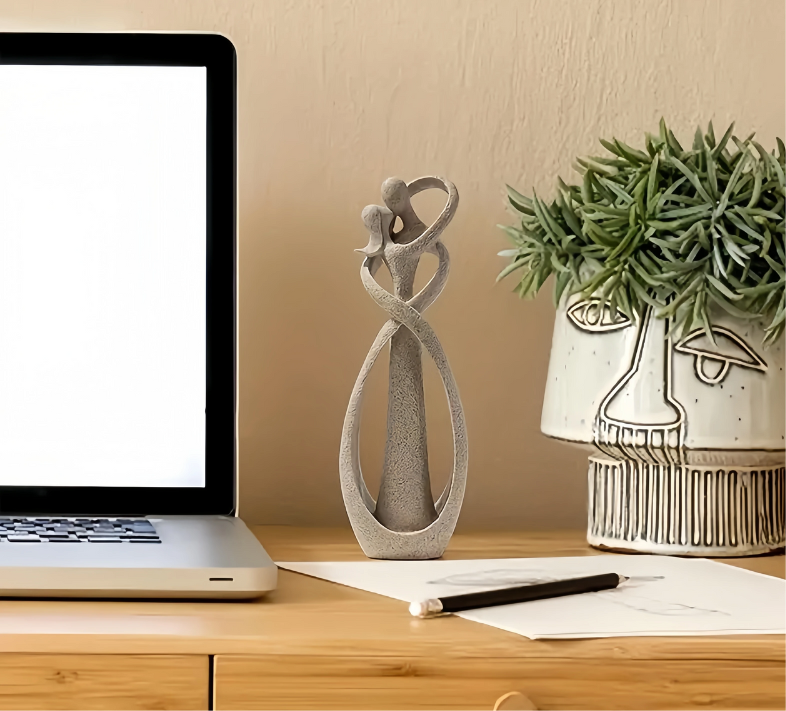 Modern skulptur med två figurer som symbol för enhet