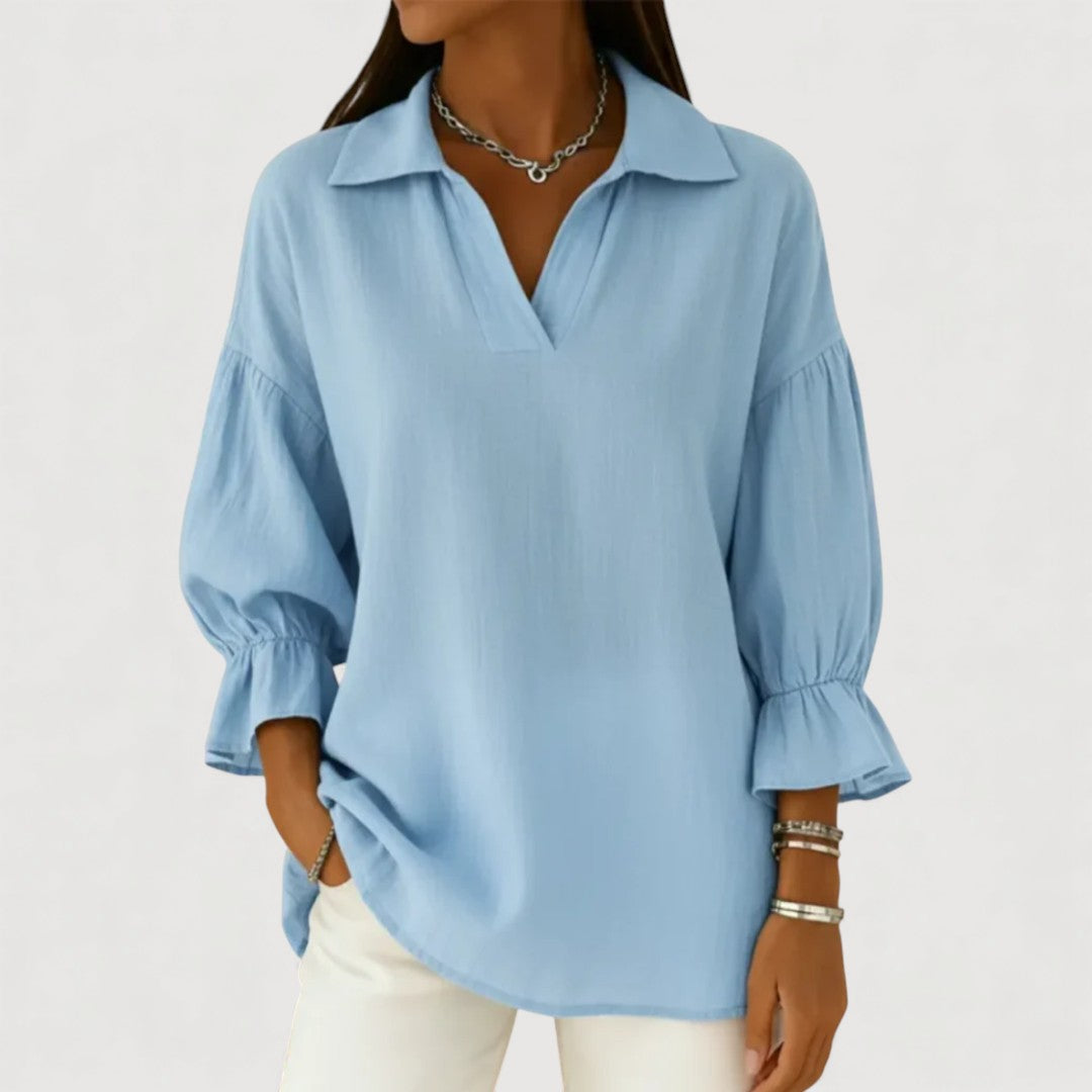 Följsam blus med V-ringad krage och puffärmar för vardagsbruk