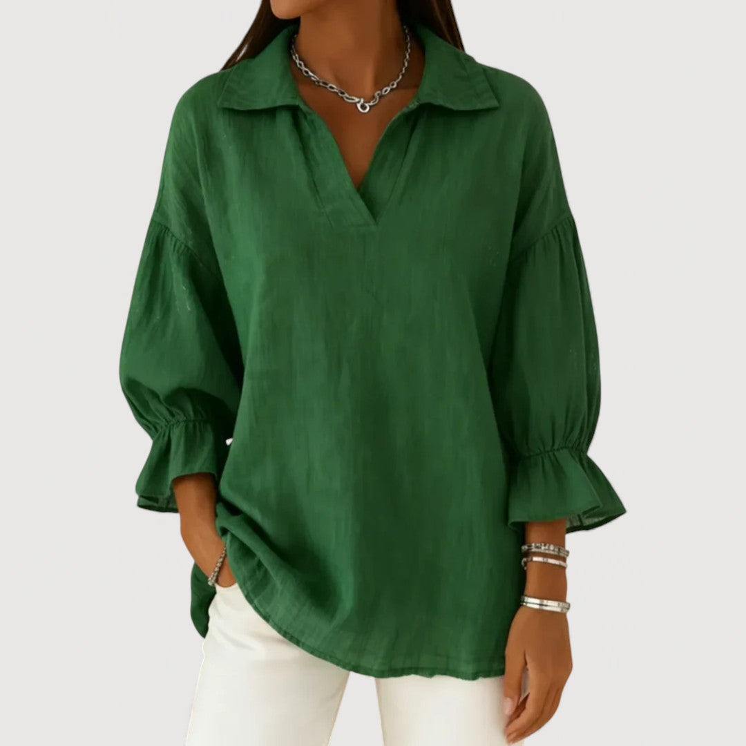 Women's relaxed-fit blouse with V-neck collar and soft puff sleeves