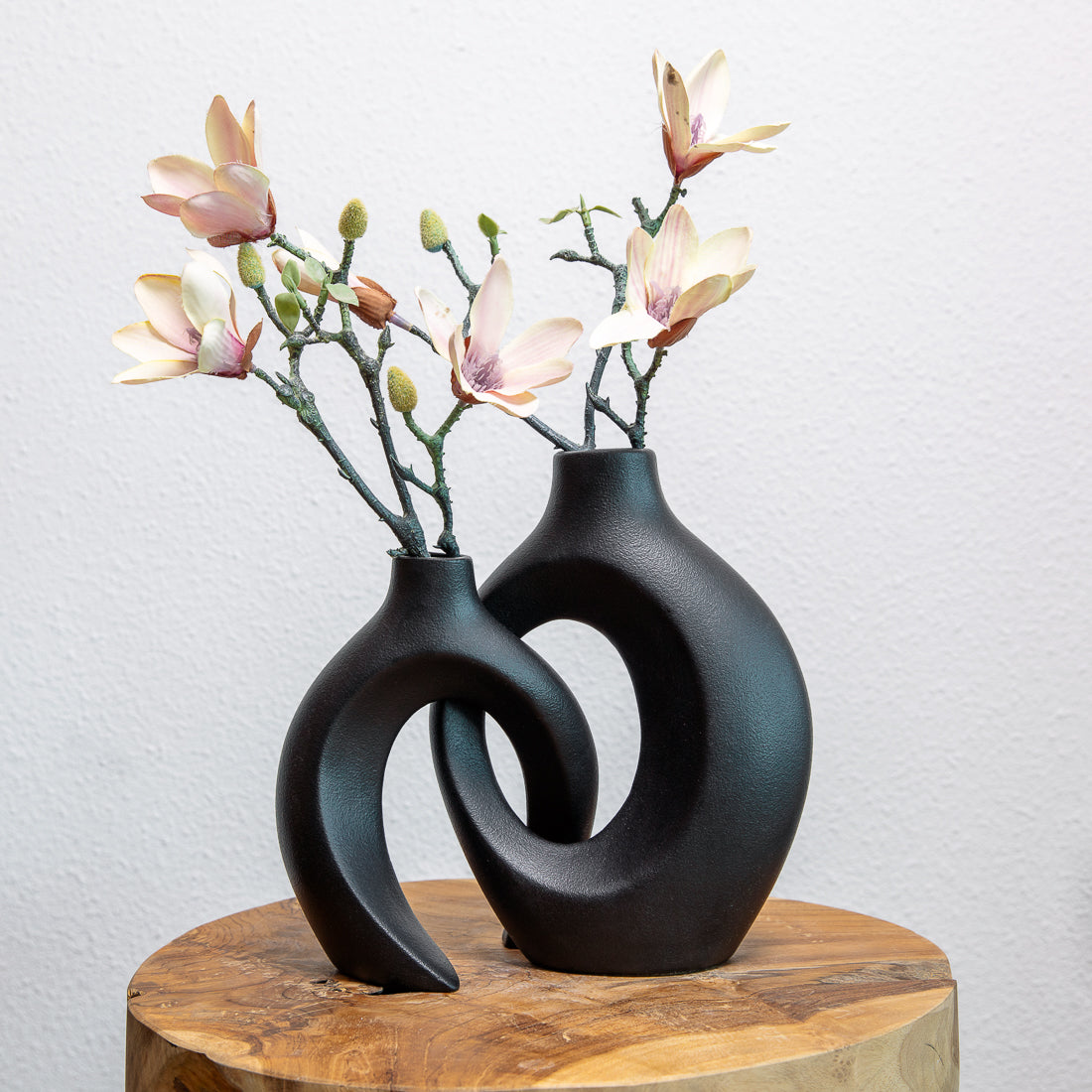 Modern sculptural vase set displayed as home décor accent piece
