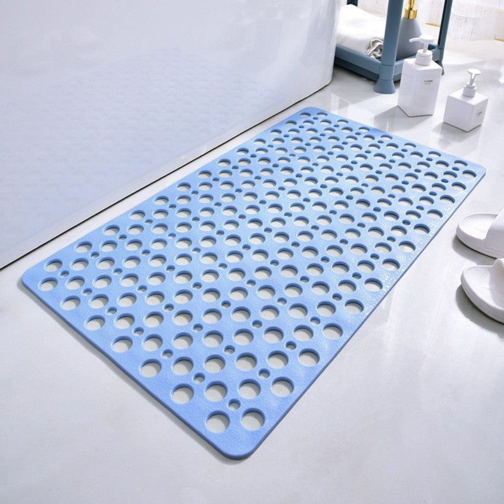 Perforated rubber bathroom mat with drainage surface for wet floor areas