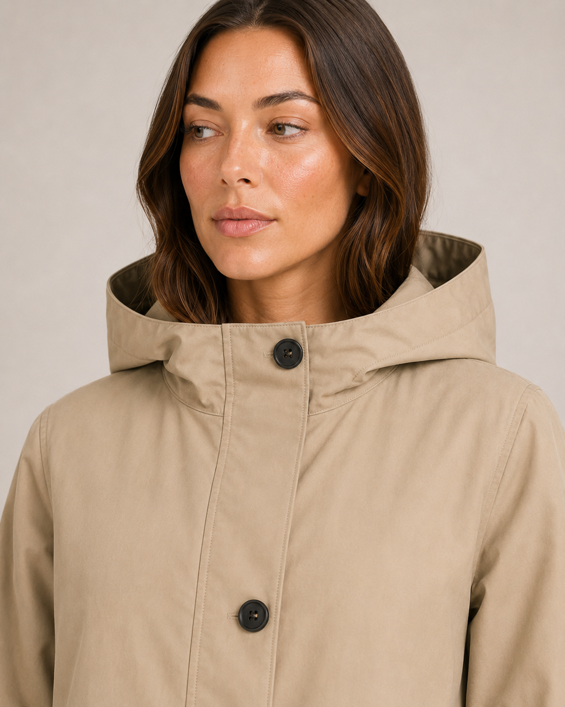 Khaki hooded raincoat women close-up detail
