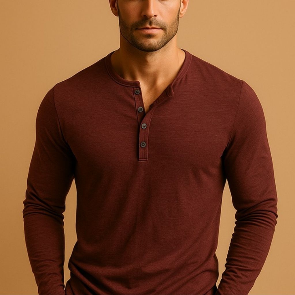 Men's Henley long-sleeved shirt laid flat, showing full length and slim fit cut