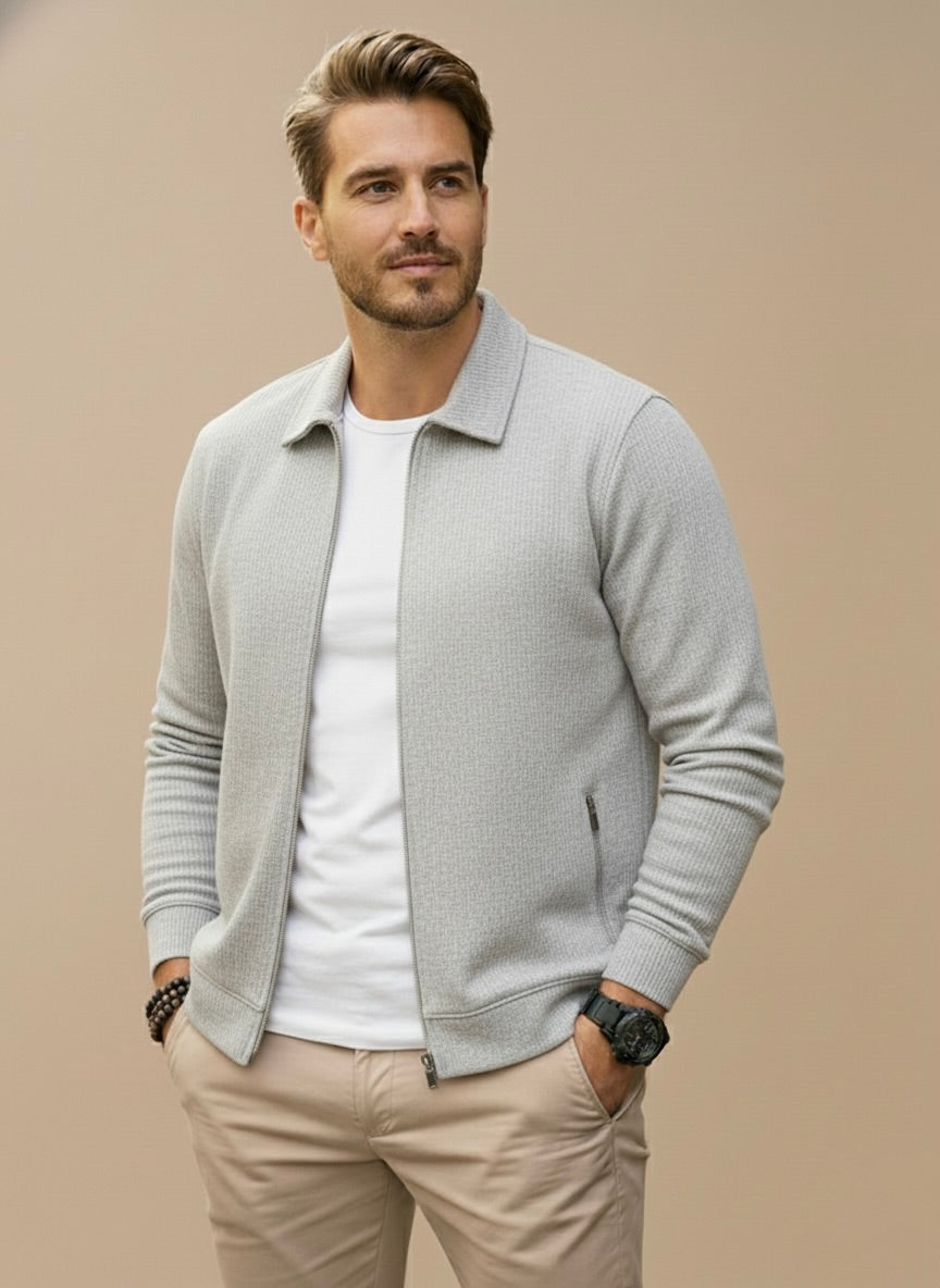Men's knitted zip jacket with structured silhouette, classic collar, and long ribbed sleeves