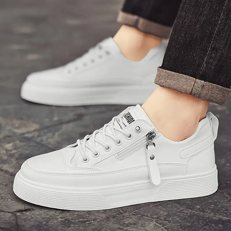 Front toe box and lace-up detail on men's low-top sneakers with metal zipper