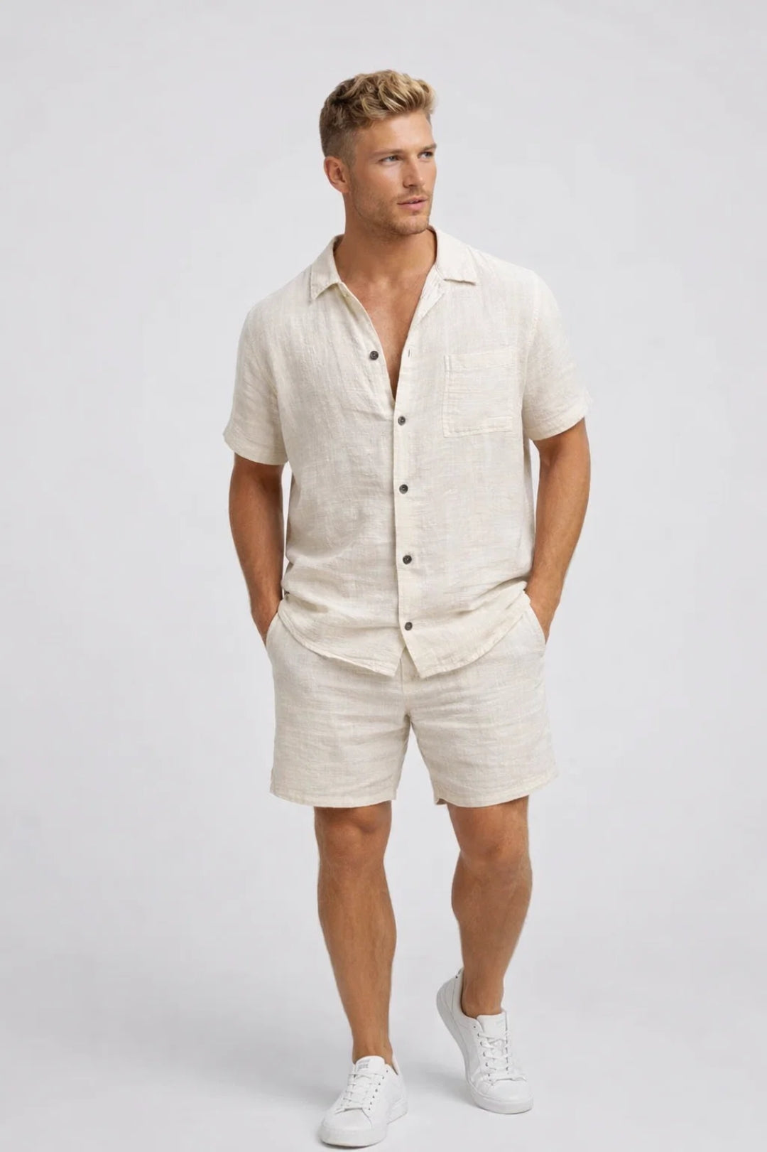 Men's linen set with short-sleeved button-up shirt and matching shorts, relaxed fit with open collar and elastic waistband