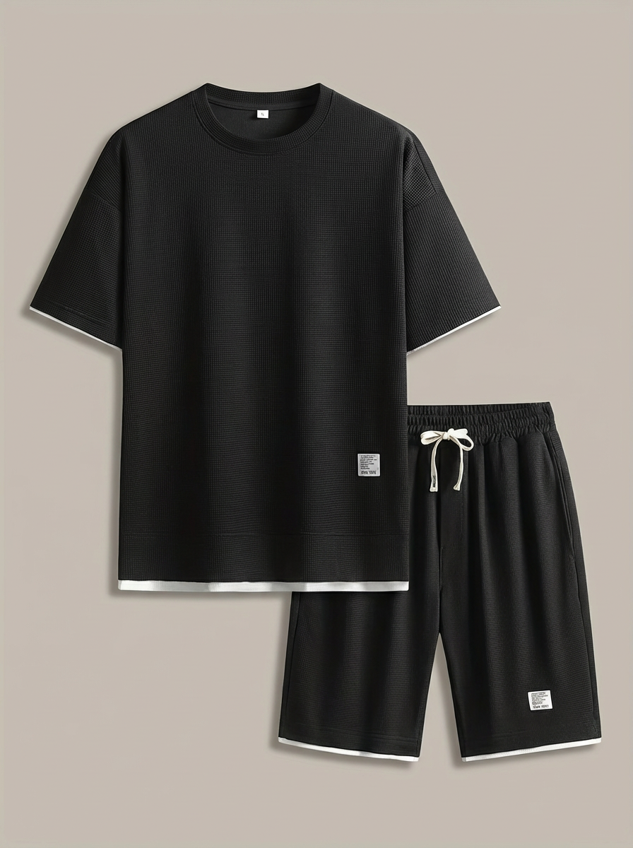 Men's activewear set featuring a crew neck tee and knee-length shorts in structured fabric