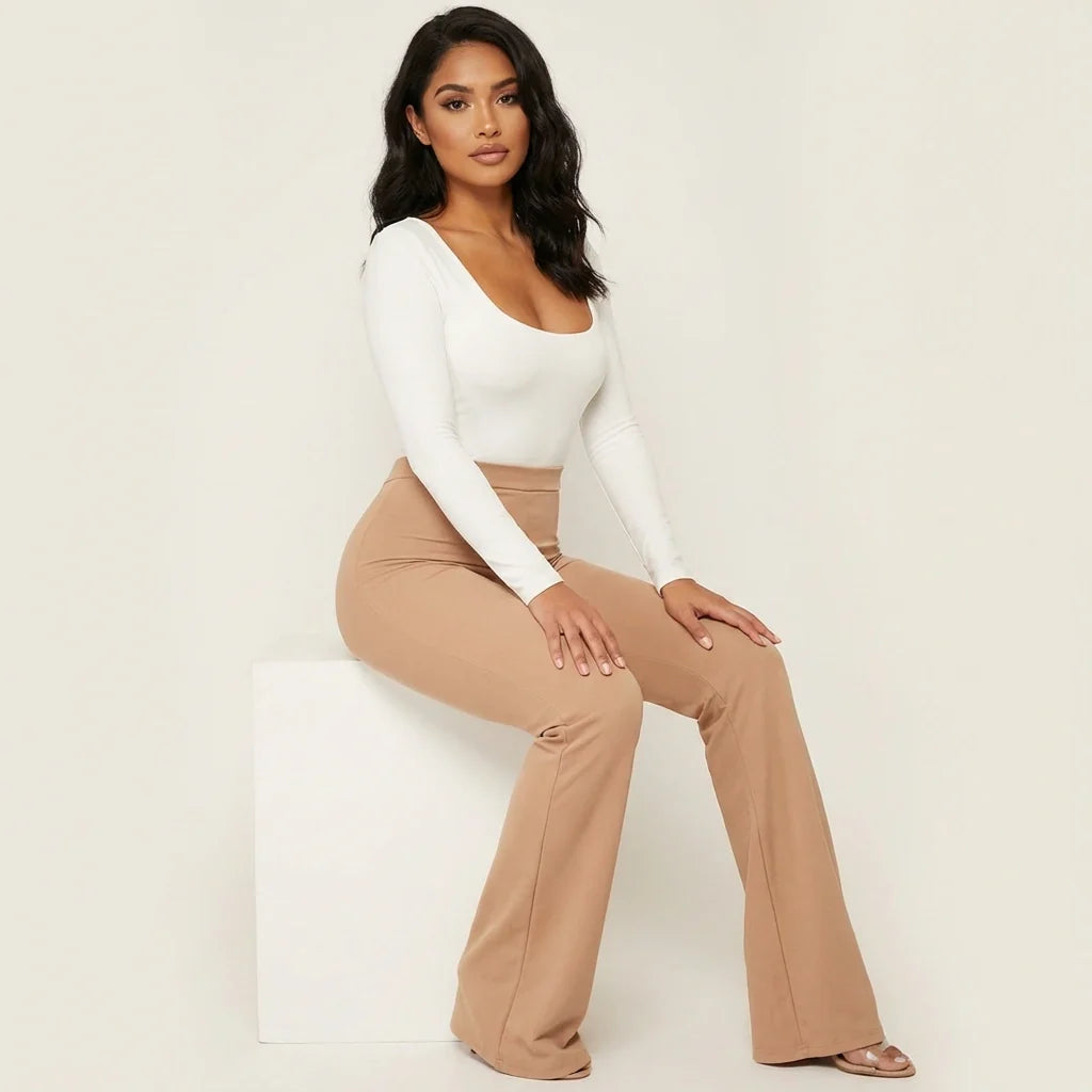 Women's Khaki high waisted flared trousers seated styling view