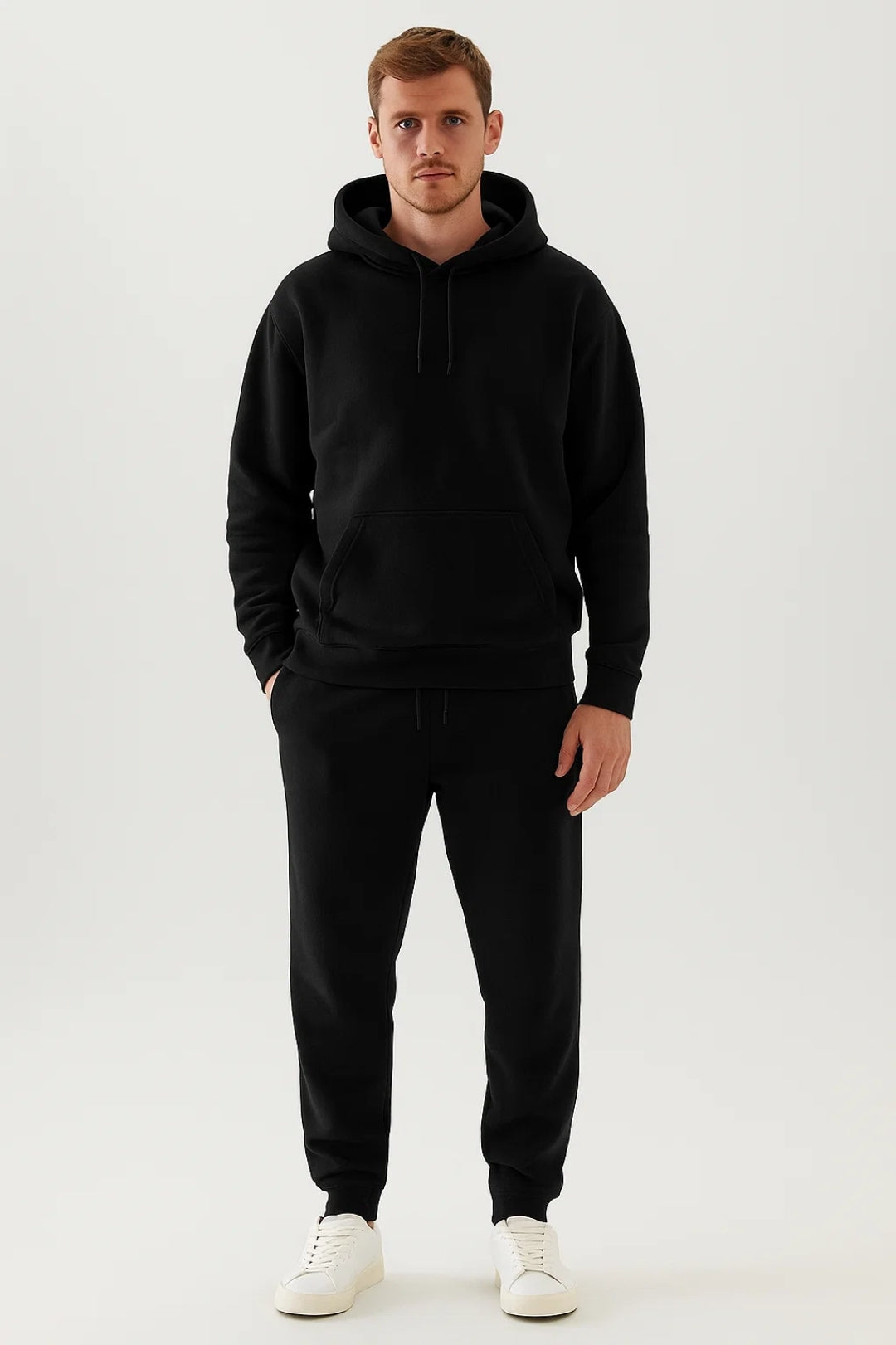 Men's casual hoodie and joggers set with a soft structured hoodie, kangaroo pocket, and tapered joggers with ribbed cuffs