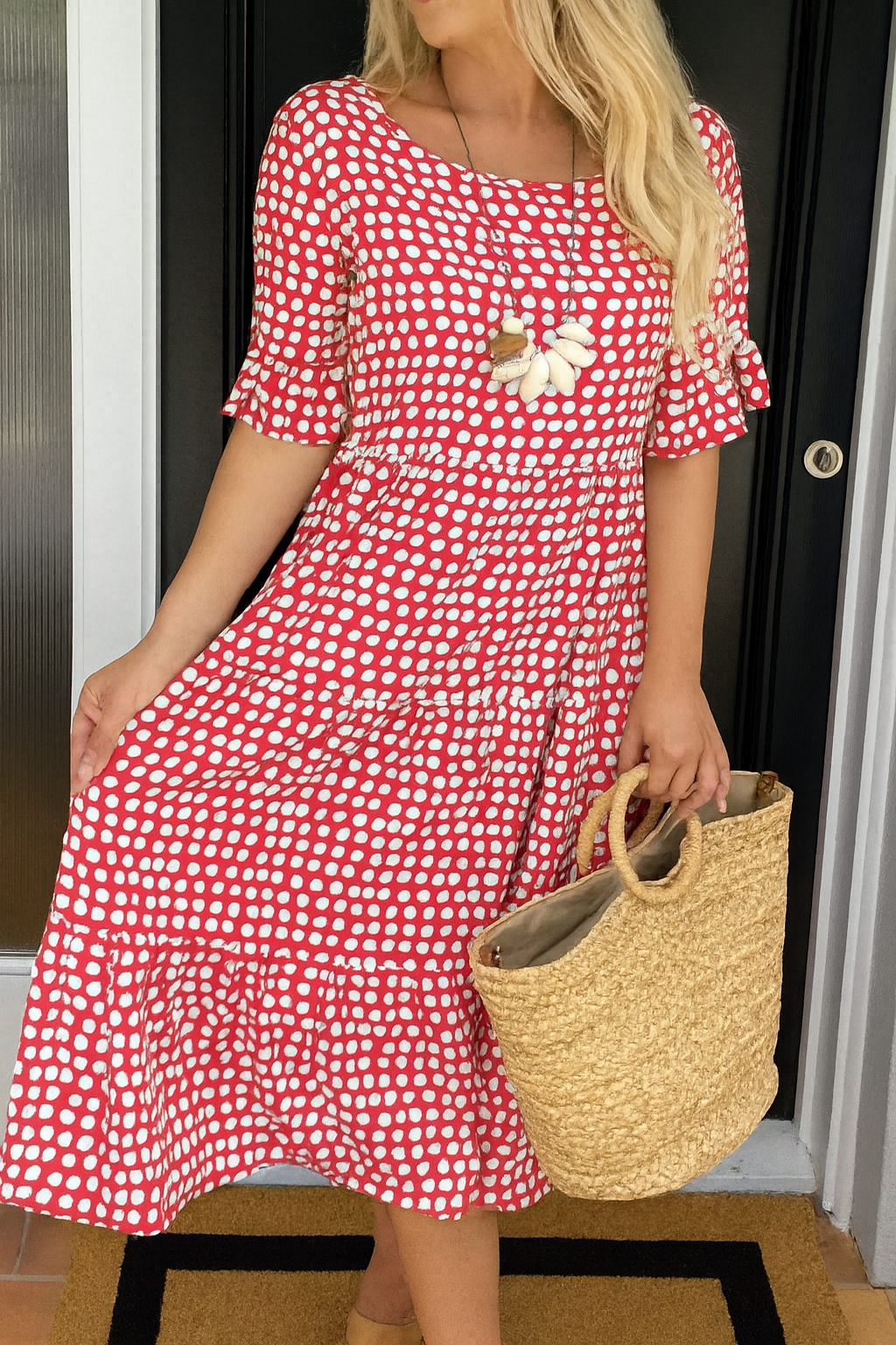 Polka dot dress with ruffled midi skirt and relaxed pull-over fit for women