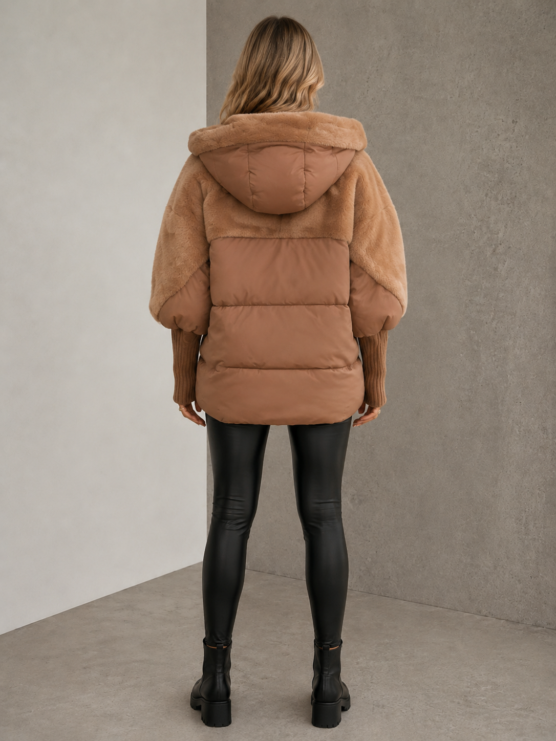 Brown padded jacket with wide collar worn by woman