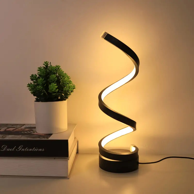 Modern bordslampa med spiraldesign och integrerad LED-belysning