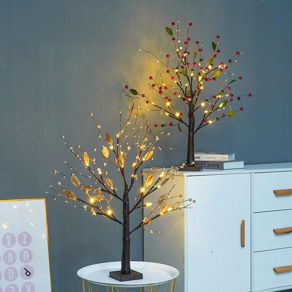 LED fir tree with flexible branches and berry accents creating atmospheric mood lighting