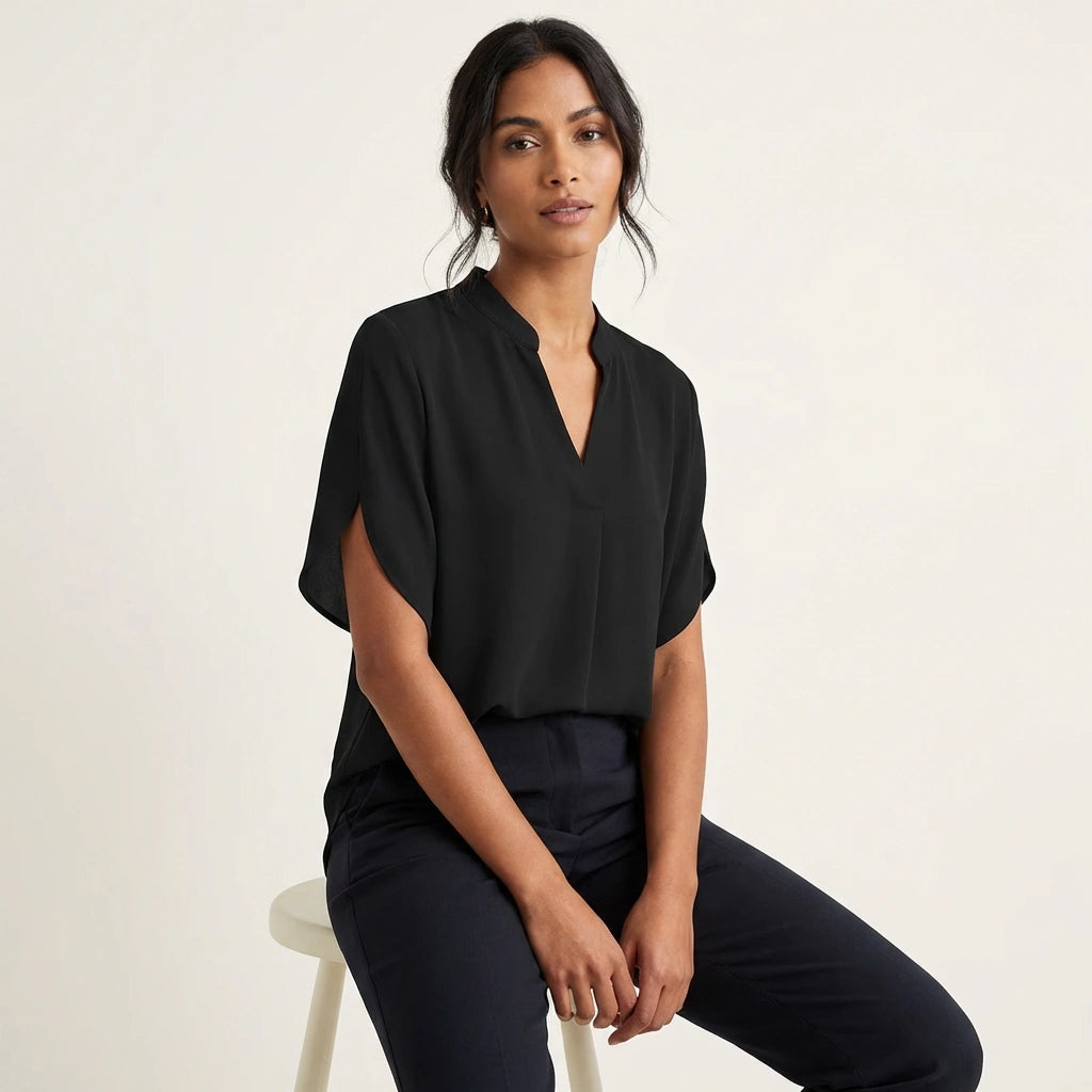 Short-sleeved V-neck women's blouse with loose sleeves and clean seam finish