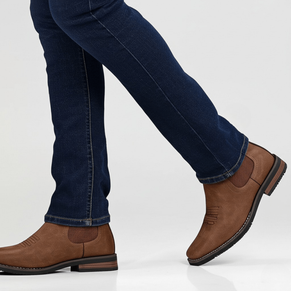 Brown Chelsea boots worn with jeans