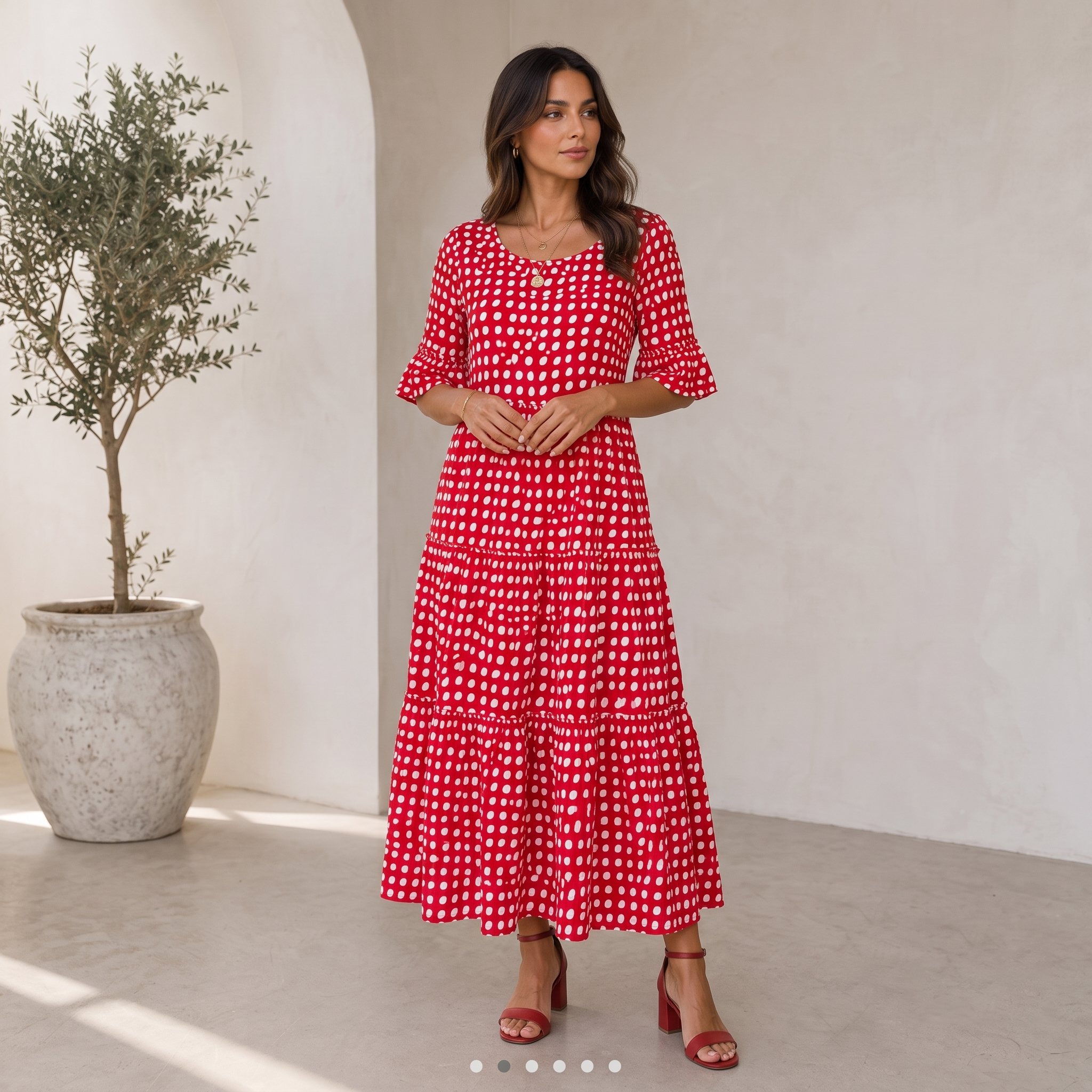 Polka dot dress with ruffled midi skirt and relaxed pull-over fit for women