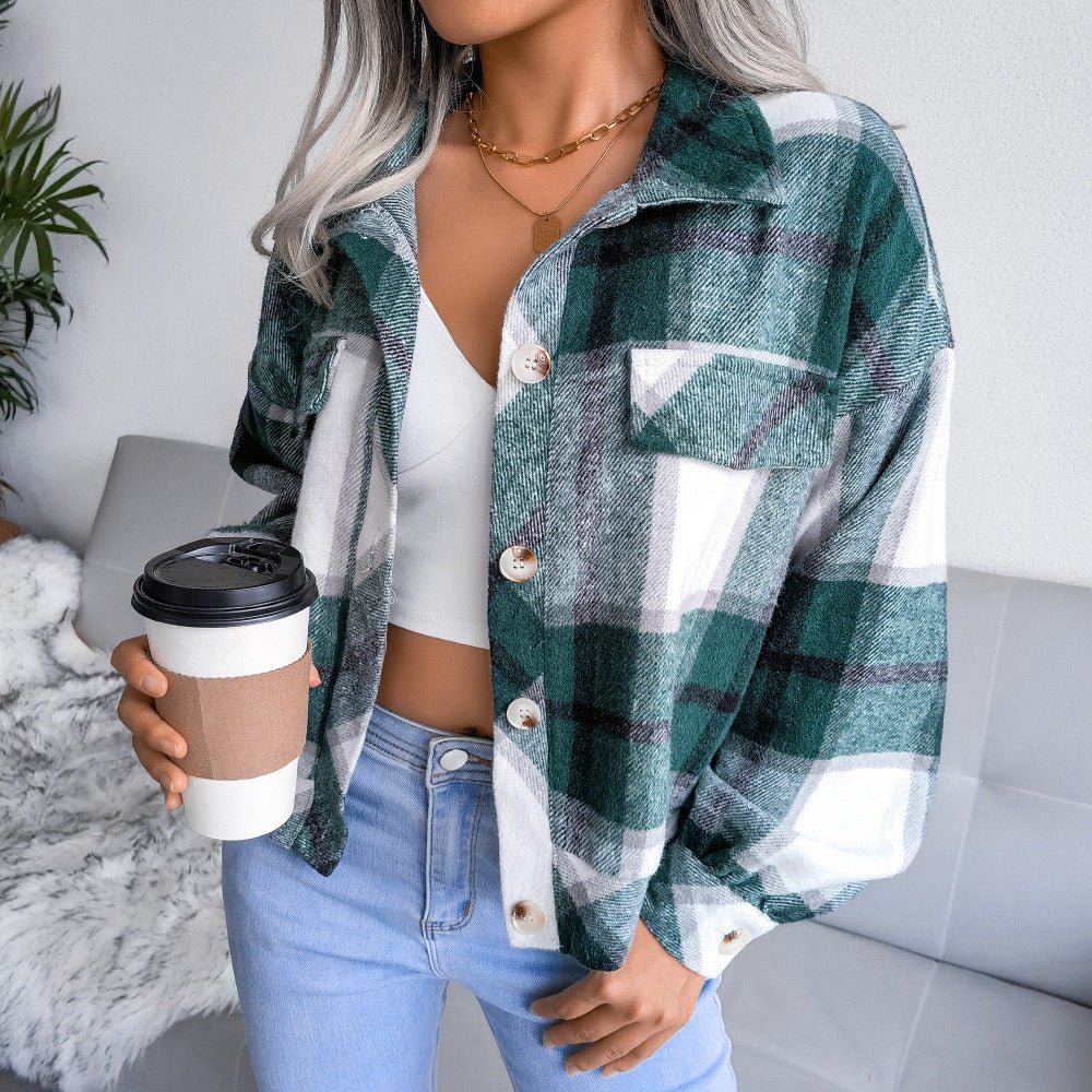 Women's plaid shirt jacket featuring a relaxed fit, shirt collar, and cuffed long sleeves