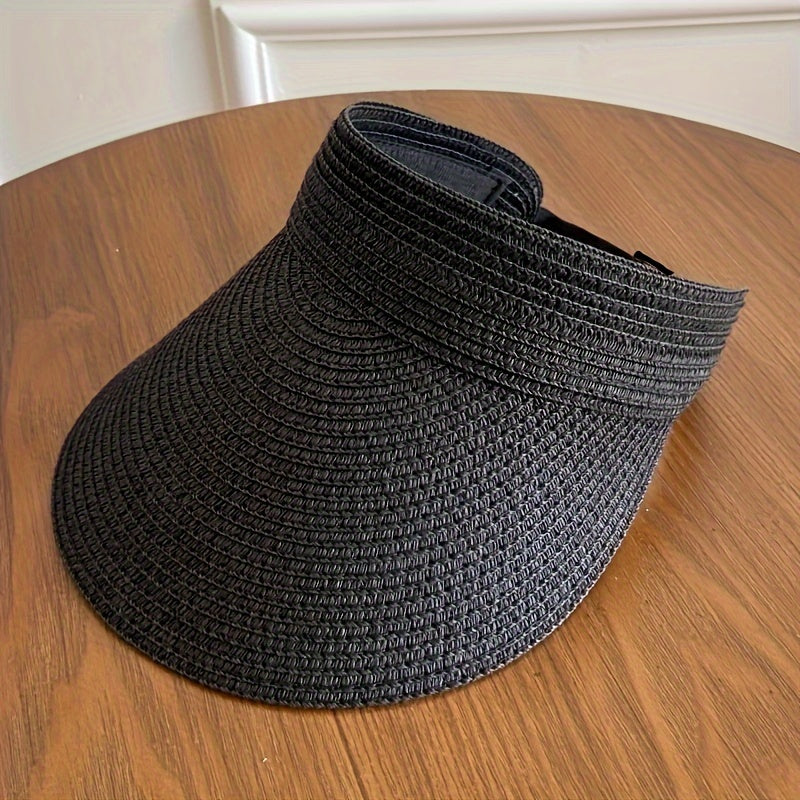 Women's woven sun visor with wide curved brim and open top, adjustable back band