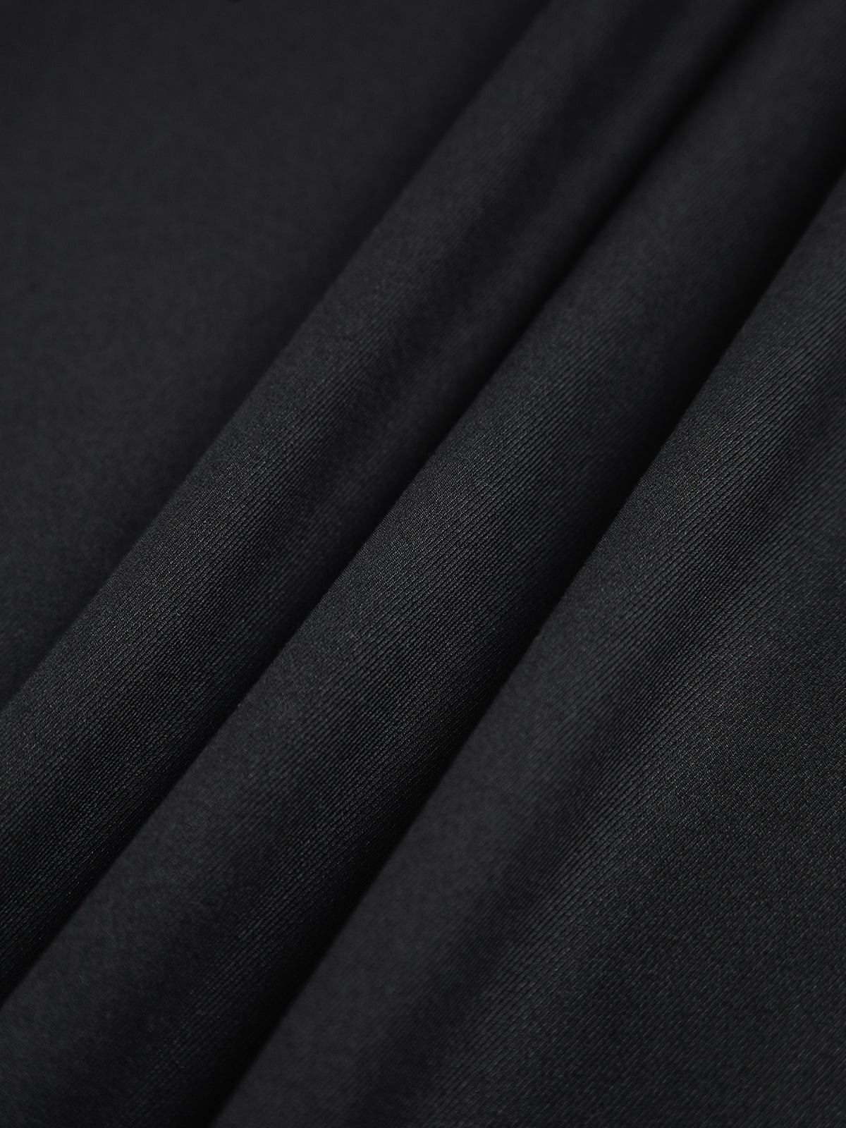 Women's wide-leg trousers, movement shot showing wide leg drape