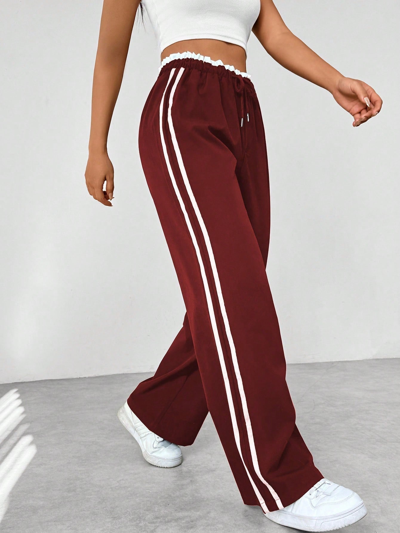 Women's wide-leg sweatpants laid flat showing full silhouette