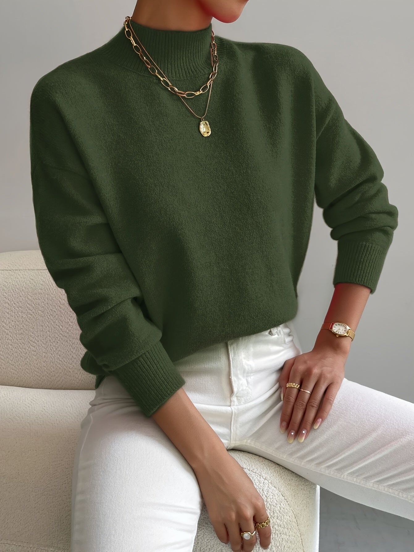 Women's cotton blend knitted sweater with high neck and ribbed cuffs