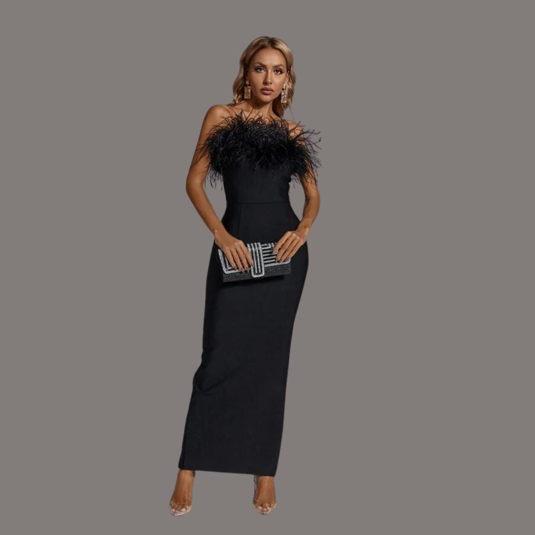 Form-fitting strapless maxi dress with feather-trimmed bustline and straight hem