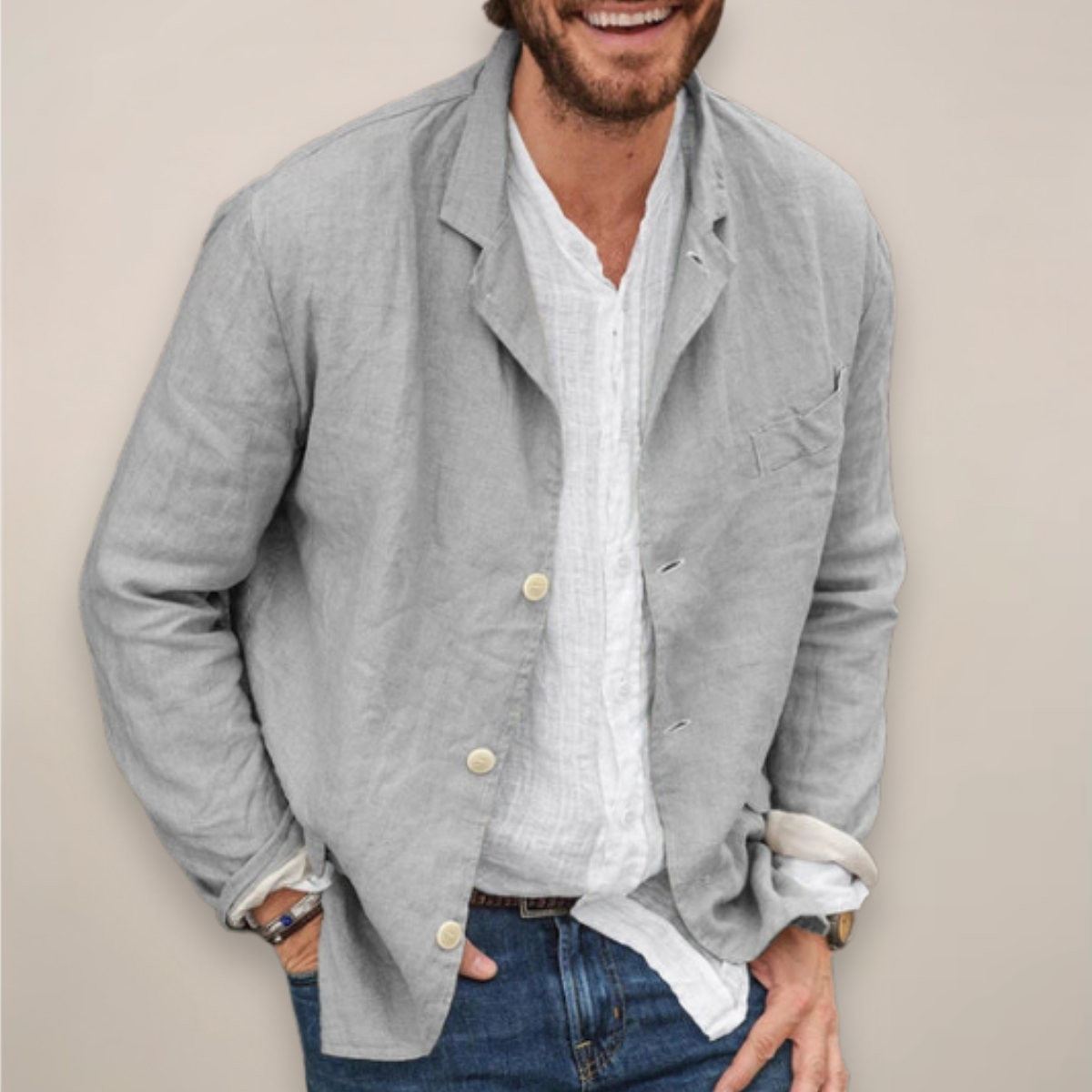 Men's relaxed-fit woven jacket with long sleeves, button cuffs, and straight hem