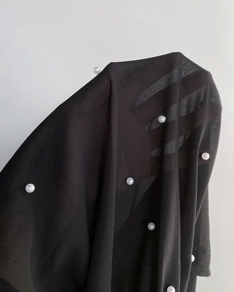 Women's transparent blouse with opaque lining and long sleeves, full-length view