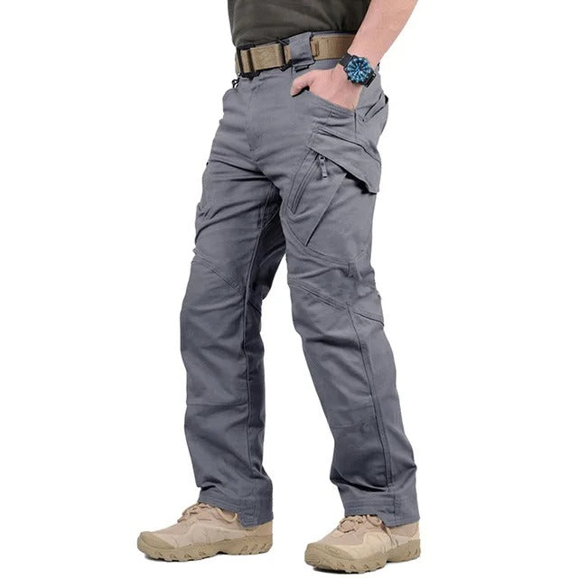 Men's cargo pants with side and front pockets, durable woven construction, and straight cut