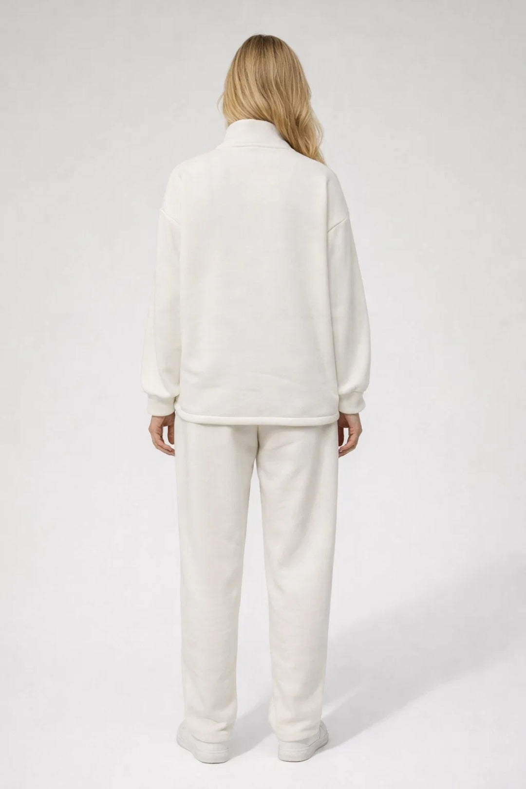 Tvådelat träningsset med åtsittande linne och högmidjade leggings för dam