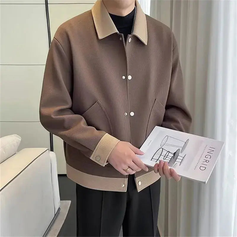 Hip-length men's jacket with snap-button closure and structured silhouette