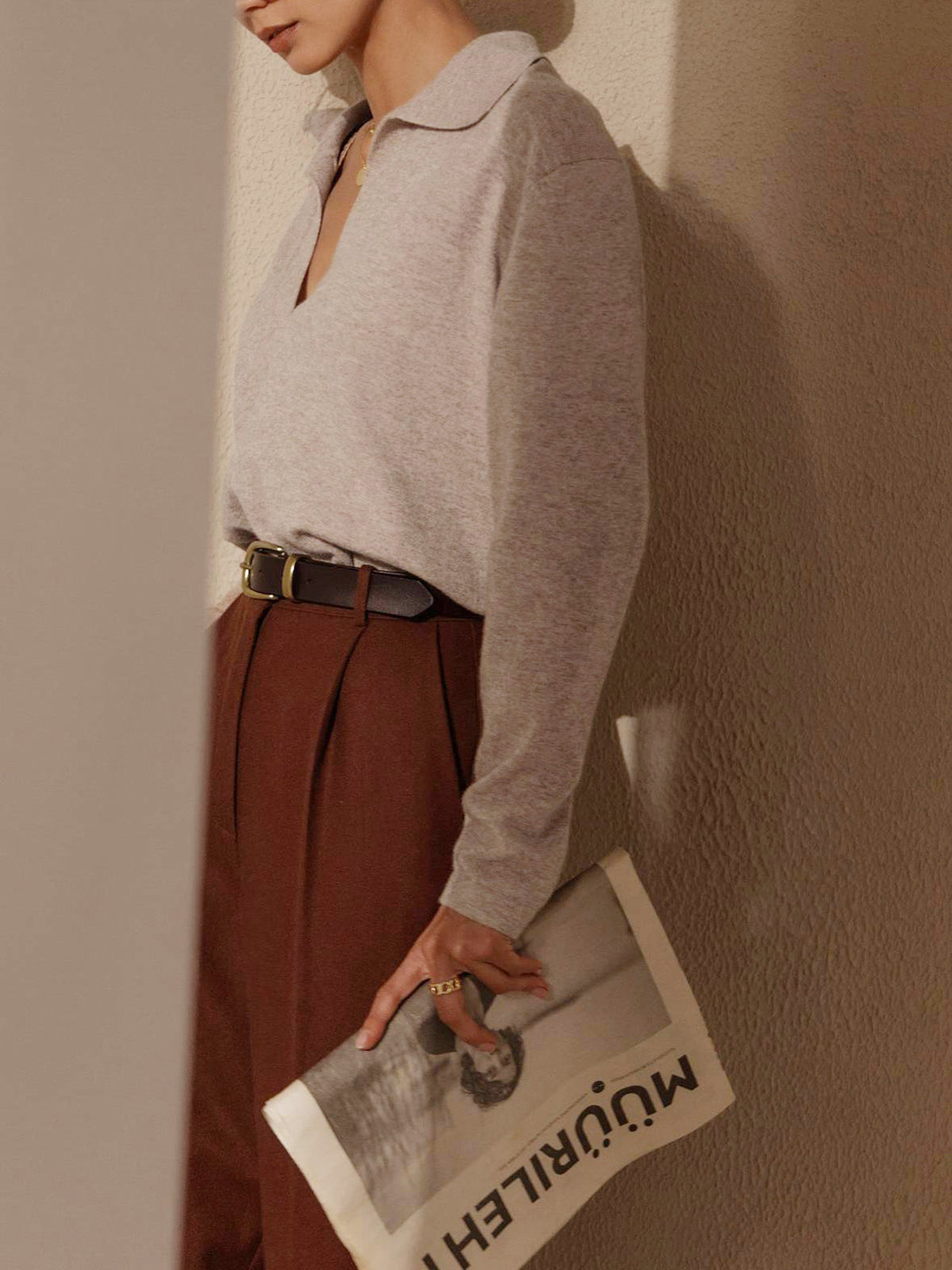 Women's pull-on knit top with soft collar and clean long-sleeve design