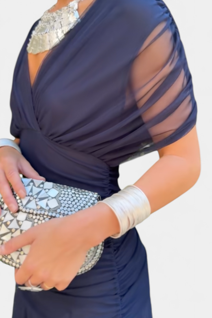 Off-shoulder maxi dress with twisted front construction and maxi-length flowing hem