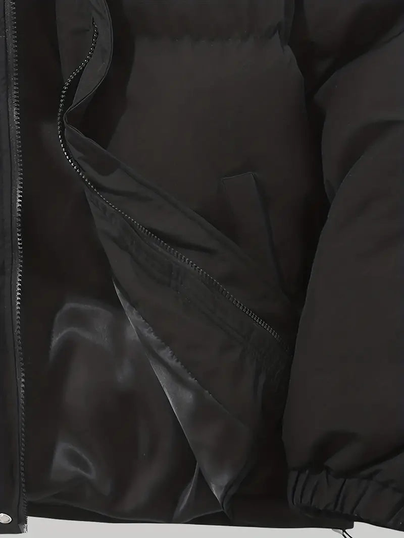 Isolerad jacka med elastiska muddar och fickor