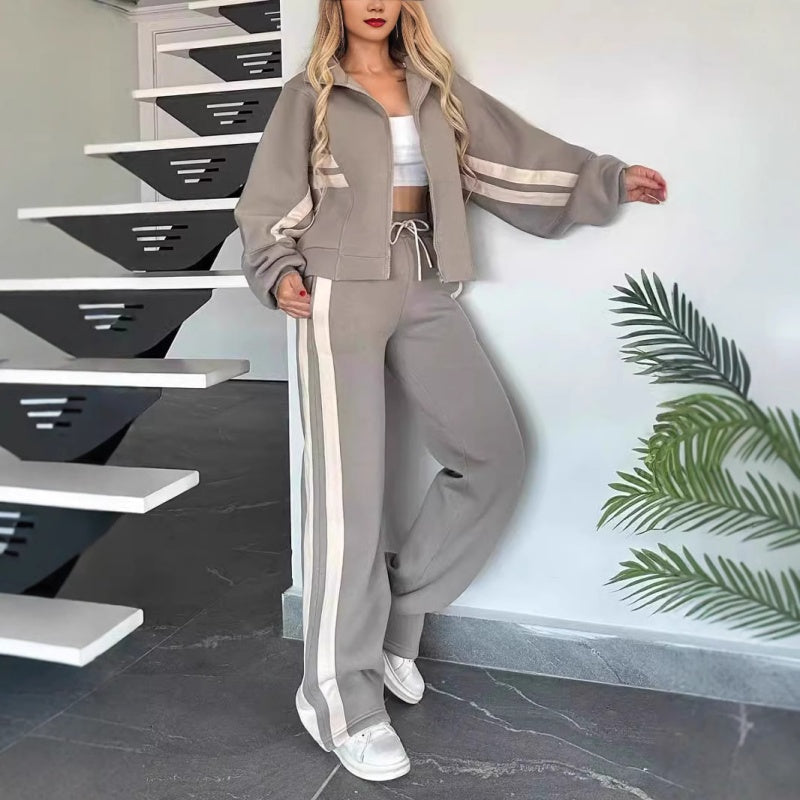 Women's coordinated lounge set with structured zip jacket and full-length wide-leg trousers in cotton blend