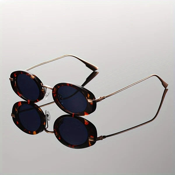 Women's leopard oval sunglasses with dark lenses